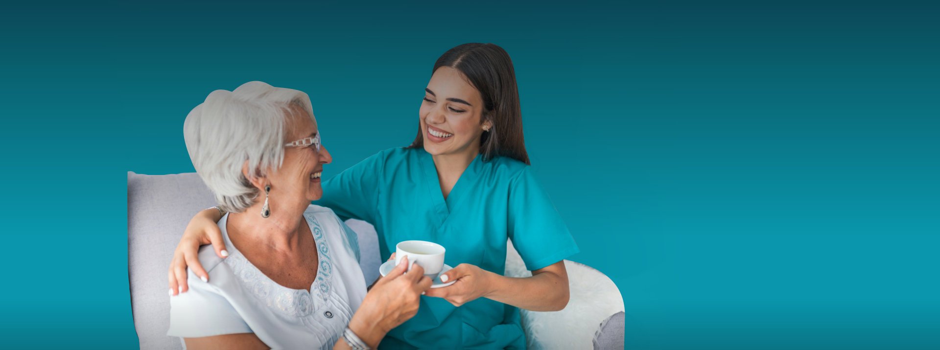 caregiver serving a tea to elderly woman